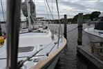 Southern Cross 39 - 1984 Southern Cross 39 sailboat docked at a marina under cloudy skies.