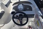 Bayliner Element 16 - 2020 Bayliner Element 16 dashboard with steering wheel and instrument panel.