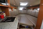 Chaparral 270 Signature - Saloon with table converted to bed