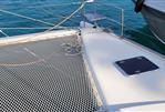 Lagoon Catamarans 440 - Bow seats, popular when dolphins at play. Or in harbour a quiet spot to read a book, or enjoy a "sundowner". Large trampolines cool relaxation, or kids fun.