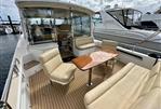 MJM 50z - 2017 MJM 50z yacht with spacious deck seating and elegant wood table.