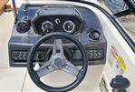 Bayliner VR5 Bowrider OB - 2019 Bayliner VR5 Bowrider OB dashboard with steering wheel and gauges.