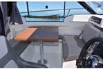 Jeanneau Merry Fisher 695 - Series 2 - Jeanneau Merry Fisher 695 wheelhouse boat - co-pilot seat converts to seating at table