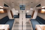 M.A.T. 1070 - Interior of 2024 M.A.T. 1070 sailboat with blue seating and modern design.