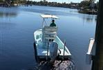 Shallow Sport 24 Mod V - 2021 Shallow Sport 24 Mod V boat cruising on a calm river.