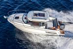 Jeanneau NC 795 S2 - 2025 Jeanneau NC 795 S2 cruising on open water, showcasing sleek design and powerful performance.