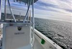 Pathfinder 2300 HPS - Pathfinder 2300 HPS boat on open water, 2017 model, under a blue sky.