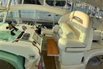 Fairline Targa 52 GT - Interior of 2003 Fairline Targa 52 GT yacht with helm and seating area.