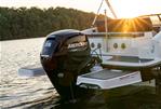 Bayliner DX2000 - 2023 Bayliner DX2000 boat with Mercury 115 outboard motor at sunset on a lake.