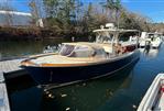 Hinckley Talaria 29C - 2013 Hinckley Talaria 29C boat docked on a calm river.