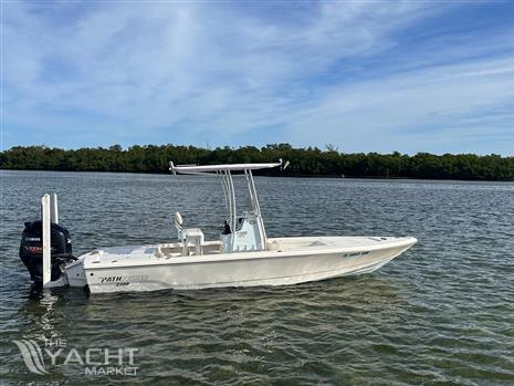 Pathfinder 2300 HPS - 2017 Pathfinder 2300 HPS boat on calm water with Yamaha engine.