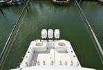 SeaHunter 33 - Aerial view of 2018 SeaHunter 33 boat with triple engines on calm water.