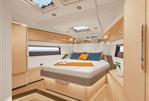 Hanse 510 - Luxurious 2023 Hanse 510 yacht bedroom with modern design and skylights.