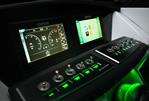 Four Winns H2 OB - 2023 Four Winns H2 OB boat dashboard with Simrad displays and illuminated controls.