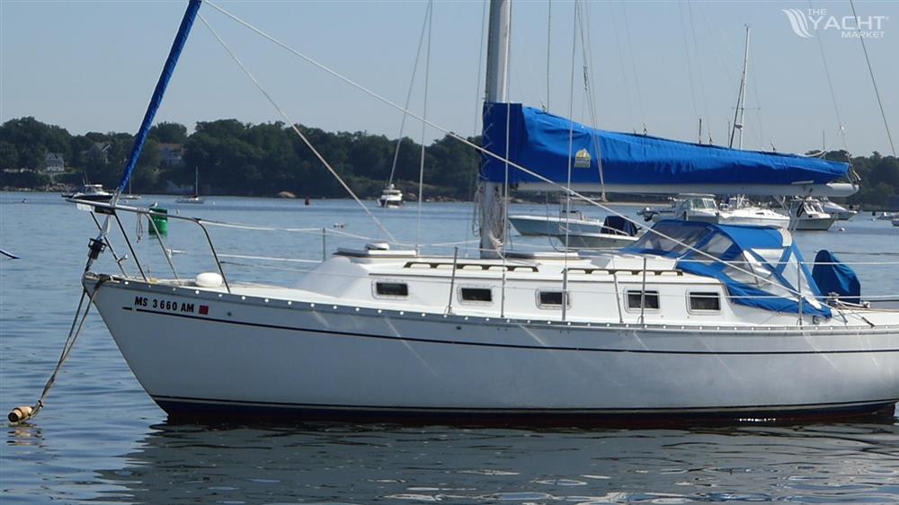 Endeavour 32 - 1979 Endeavour 32 sailboat with blue sail cover anchored in calm waters.