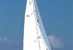 Beneteau 393 - 2003 Beneteau 393 sailboat cruising on open water under clear blue sky.