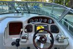 Sea Ray 340 Sundancer - 2006 Sea Ray 340 Sundancer helm with navigation instruments and controls.