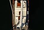 Formosa 41 - Aerial view of a 1973 Formosa 41 sailboat docked with a dinghy.