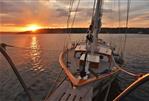 Formosa 41 - Sailing yacht Formosa 41 (1973) at sunset on calm waters.