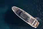 Prestige X70 - Aerial view of 2025 Prestige X70 yacht cruising on deep blue water.