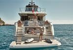Prestige X70 - People enjoying leisure time on a 2025 Prestige X70 yacht in the ocean.