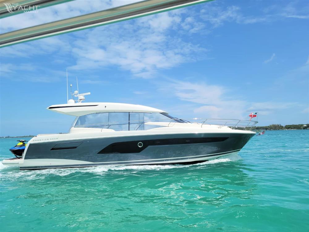 Prestige 520S - Prestige 520 S 2020 yacht cruising on turquoise waters under a clear blue sky.