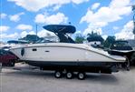 Sea Ray 270 SDX - 2018 Sea Ray 270 SDX boat on a trailer under a blue sky.