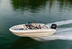 Bayliner VR4 OB - 2024 Bayliner VR4 OB speedboat cruising on a calm lake.