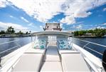 Prestige 520 Fly - Prestige 520 Fly 2020 yacht with sun loungers and scenic waterway view.