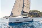 Hanse 410 - 2024 Hanse 410 sailing yacht on open water.