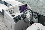 Harris 250 Sunliner Sport - 2023 Harris 250 Sunliner Sport boat dashboard with steering wheel and touchscreen display.