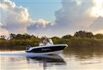 Bayliner Trophy 20 CC - 2023 Bayliner Trophy 20 CC boat cruising on calm water at sunset.