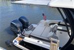 Chaparral 300 OSX - 2019 Chaparral 300 OSX boat docked with twin Yamaha engines.