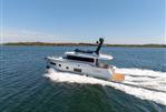 Sirena 58 Flybridge - 2024 Sirena 58 Flybridge yacht cruising on open water.