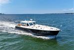 MJM 50z - 2017 MJM 50z yacht cruising on open water.