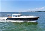 MJM 50z - 2017 MJM 50z yacht cruising on open water.