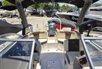 Chaparral 230 - 2021 Chaparral 230 boat interior with seating and outboard motor.