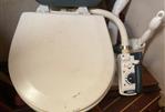 Jeanneau Attalia - Marine toilet on a 1983 Jeanneau Attalia sailboat, featuring manual pump controls.