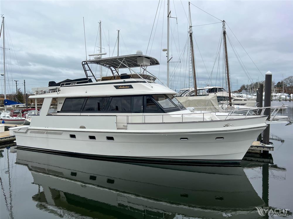 Southern Cross 53 - 1986 Southern Cross 53 yacht docked at marina, overcast sky.