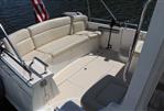 MJM 36z Downeast - 2013 MJM 36z Downeast boat with beige seating and American flag.