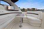 Sea Ray 38 Sundancer - Luxurious 2006 Sea Ray 38 Sundancer yacht interior with plush seating and scenic view.