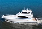 Bertram 670E - 2004 Bertram 670E yacht cruising on open water.
