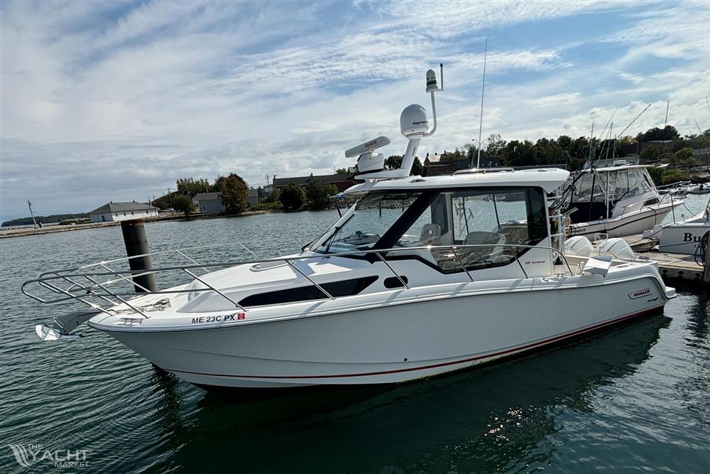 Boston Whaler 325 Conquest Pilothouse - 2020 Boston Whaler 325 Conquest Pilothouse boat docked in a marina.