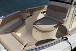 Scout 215 XSF - 2023 Scout 215 XSF boat interior with beige seating and speaker.
