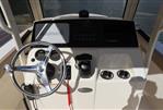 Scout 215 XSF - 2023 Scout 215 XSF boat dashboard with Garmin navigation system.