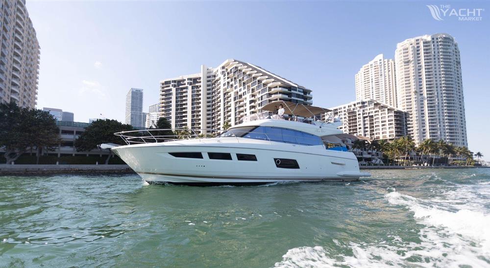 Prestige 550 - Prestige 550 yacht cruising near city skyline, 2014 model.