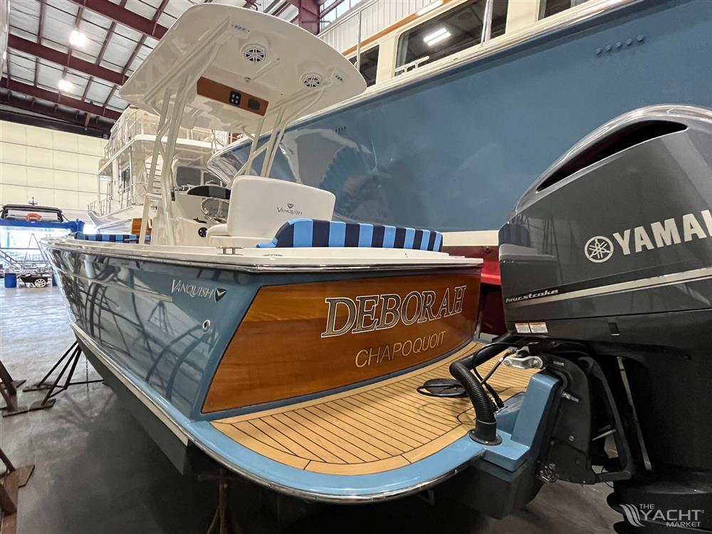 Vanquish 26 - 2021 Vanquish 26 boat with Yamaha engine in a storage facility.