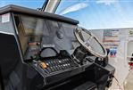 Pursuit OS 355 Offshore - 2018 Pursuit OS 355 Offshore helm with modern navigation controls and steering wheel.