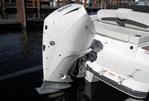 Four Winns HD3 - 2022 Four Winns HD3 boat with powerful outboard motor, docked in marina.