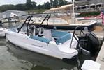 Axopar 25 Cross Top - 2022 Axopar 25 Cross Top boat docked with Mercury engine.